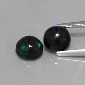 1.26 ct Multicolor Black Opal Gemstone, Black Opal Gem in Round Cabochon Shape for Sale.