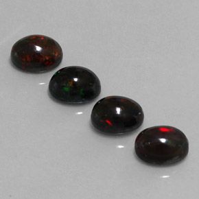 4.29 ct Multicolor Black Opal Gemstone, Black Opal Gem in Oval Cabochon Shape for Sale.