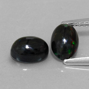 1.16 ct Multicolor Black Opal Gemstone, Black Opal Gem in Oval Cabochon Shape for Sale.