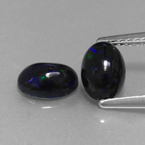 1.02 ct Multicolor Black Opal Gemstone, Black Opal Gem in Oval Cabochon Shape for Sale.