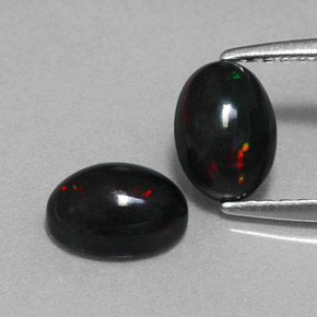 1.06 ct Multicolor Black Opal Gemstone, Black Opal Gem in Oval Cabochon Shape for Sale.