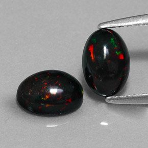 0.99 ct Multicolor Black Opal Gemstone, Black Opal Gem in Oval Cabochon Shape for Sale.