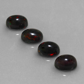 Multicolor Black Opal Gem - 0.6ct Oval Cabochon (ID: 329786)