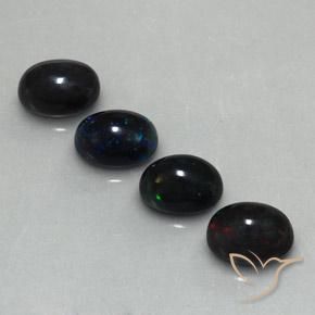 Лот из Бирмы: 4 шт. Овал Многоцветный Черный Опал - общий вес 5,72 ct / средний вес. 1,43 ct каждый, размер 9,1 x 7,1 mm, цвет: Многоцветный, твердость по Моосу 5,5 - 6,5, Photo A
