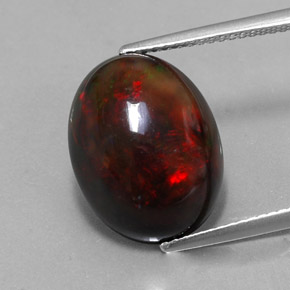 6.26 ct Multicolor Black Opal Gemstone, Black Opal Gem in Oval Cabochon Shape for Sale.