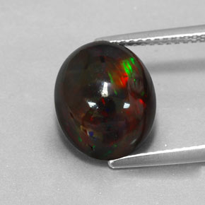 3.84 ct Multicolor Black Opal Gemstone, Black Opal Gem in Oval Cabochon Shape for Sale.