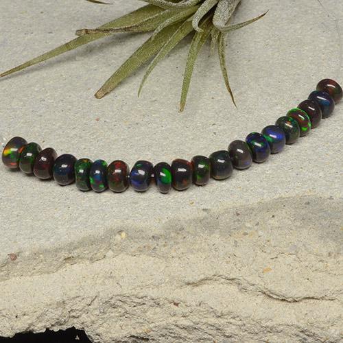 20pc Fancy Multicolor Black Opal Lot from Ethiopia - Weight 5.66ct total / avg. 0.28ct each, Size 4.8 x 4.5mm, Color: Multicolor, Mohs Hardness 5.5 - 6.5, Photo A