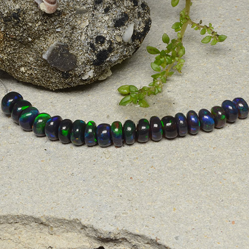 20pc Fancy Multicolor Black Opal Lot from Ethiopia - Weight 4.92ct total / avg. 0.25ct each, Size 4.7 x 4.5mm, Color: Multicolor, Mohs Hardness 5.5 - 6.5, Photo A