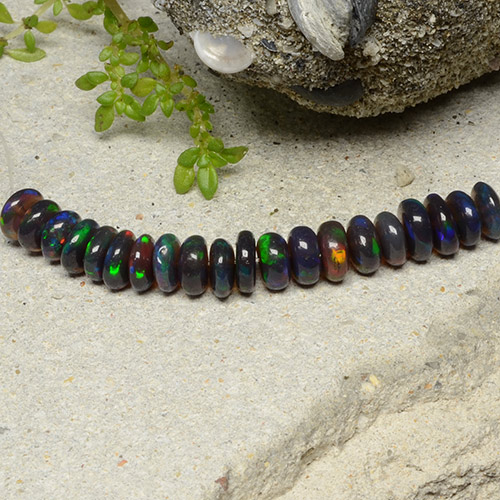 20pc Fancy Multicolor Black Opal Lot from Ethiopia - Weight 4.29ct total / avg. 0.21ct each, Size 4.8 x 4.7mm, Color: Multicolor, Mohs Hardness 5.5 - 6.5, Photo A