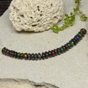 0.1ct Rondelle Multicolor Black Opal Gem for sale 0.1ct Rondelle Multicolor Black Opal Gem (ID: 482438)