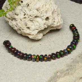 0.1ct Rondelle Multicolor Black Opal Gem for sale 0.1ct Rondelle Multicolor Black Opal Gem (ID: 482441)