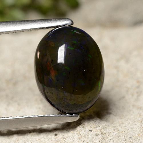 1.7ct Oval Cabochon Multicolor Black Opal for sale thumb image of 1.7ct Oval Cabochon Multicolor Black Opal (ID: 490866)
