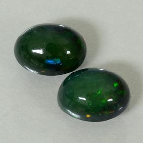 彩色 黑蛋白石 Gem - 0.9ct 椭圆形凸面型 (ID: 499846)