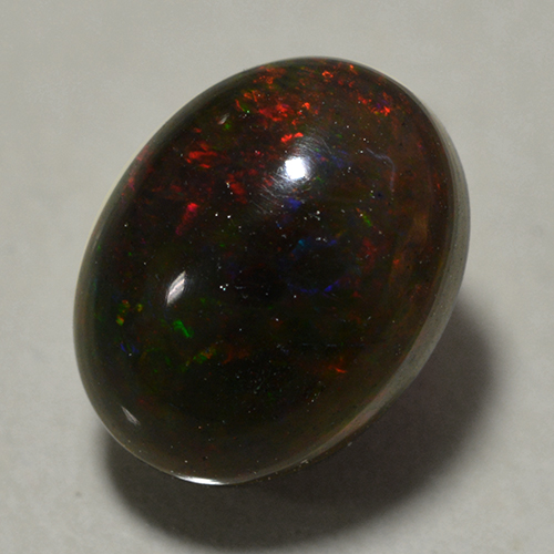 Multicolor Black Opal Gem - 0.9ct Oval Cabochon (ID: 500355)