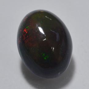 0.7ct Oval Cabochon Multicolor Black Opal Gem for sale 0.7ct Oval Cabochon Multicolor Black Opal Gem (ID: 500360)