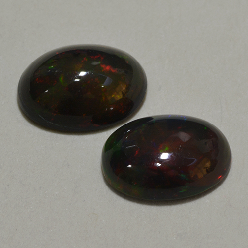 Multicolor Black Opal Gem - 0.7ct Oval Cabochon (ID: 500362)