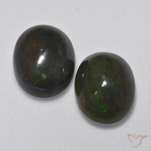 9,1 x 7,2mm Paar ovaler Schwarzer Opal - Gewicht 2,72 ct gesamt / durchschn. 1,36 ct, Mehrfarbig Farbe in Translucent Reinheit, natürlicher Edelstein, Mohs-Härte 5,5 - 6,5, Photo A