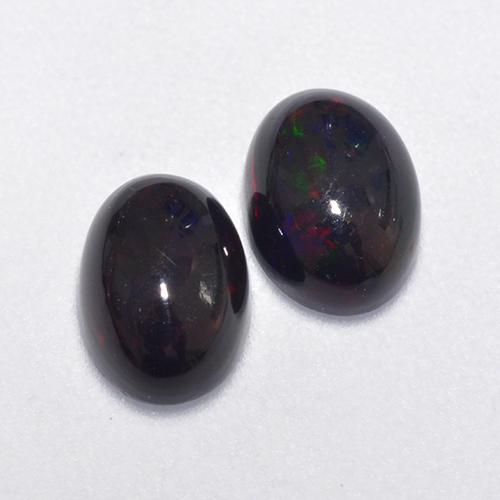 Mehrfarbig Schwarzer Opal Edelstein - 0.5ct Oval Cabochon (ID: 518588)
