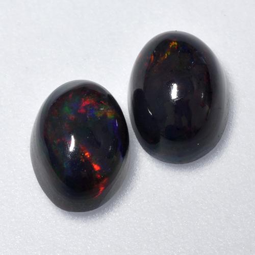 Multicolor Black Opal Gem - 0.6ct Oval Cabochon (ID: 518589)