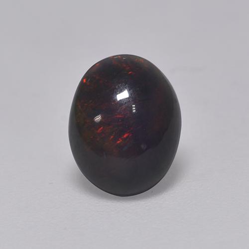 マルチカラー ブラックオパール 宝石 - 0.9ct オーバル カボション (ID: 529759)