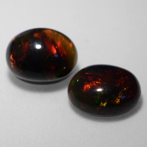Multicolor Ópalo Negro Gema - 0.9ct Cabujón Óvalo (ID: 537914)