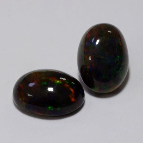 マルチカラー ブラックオパール 宝石 - 1.2ct オーバル カボション (ID: 538337)