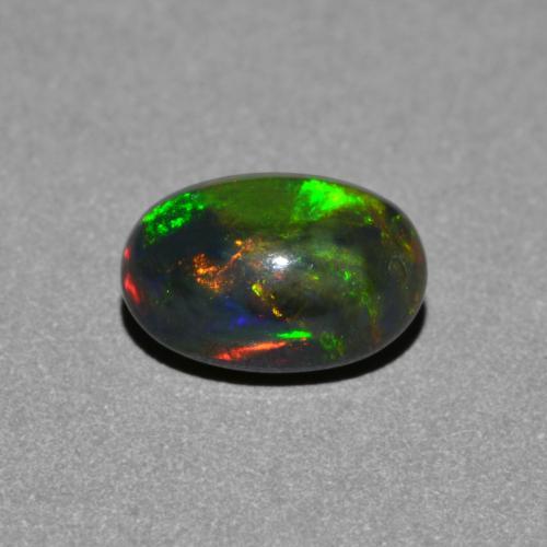 Multicolor Black Opal Gem - 0.8ct Oval Cabochon (ID: 581353)