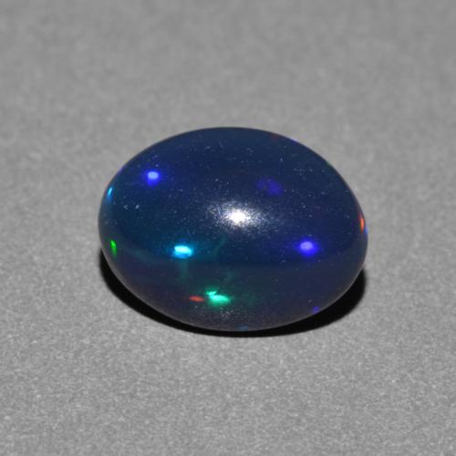 Multicolor Black Opal Gem - 0.9ct Oval Cabochon (ID: 581355)