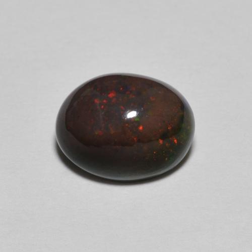 Opale Noir Multicolore oval cabochon 9,2 x 7,2mm d'Éthiopie, poids de 1,32 ct, pierre gemme naturelle Non traité de pureté Opaque , 1 pièce d'opale noire, couleur : Multicolore, dureté de Mohs de 5.5 à 6.5, Photo A