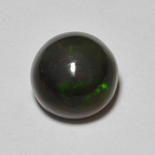 来自埃塞俄比亚 1,04 克拉圆形彩色黑蛋白石,尺寸 7 mm 毫米,天然宝石,不透明 净度,1 圆形凸面型黑蛋白石,莫氏硬度为 5,5 - 6,5, Photo A