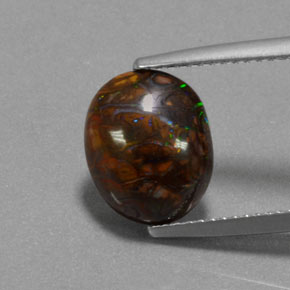4.95 ct Multicolor Boulder Opal Gemstone, Boulder Opal Gem in Oval Cabochon Shape for Sale.