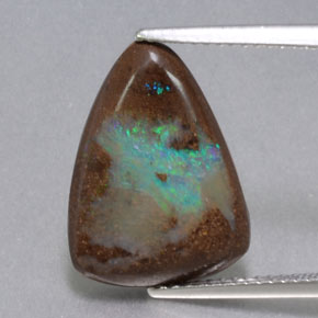 6.39 ct Multicolor Boulder Opal Gemstone, Boulder Opal Gem in Trillion Cabochon Shape for Sale.