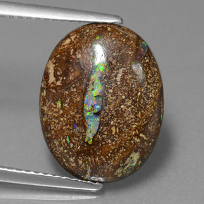 5.89 ct Multicolor Boulder Opal Gemstone, Boulder Opal Gem in Oval Cabochon Shape for Sale.
