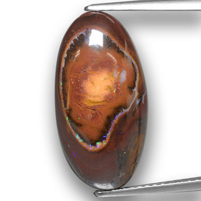 10.73 ct Multicolor Boulder Opal Gemstone, Boulder Opal Gem in Oval Cabochon Shape for Sale.