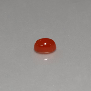0.57 ct Orange Carnelian Gemstone, Carnelian Gem in Oval Cabochon Shape for Sale.