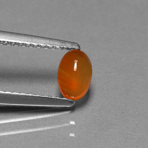 0.47 ct Orange Carnelian Gemstone, Carnelian Gem in Oval Cabochon Shape for Sale.