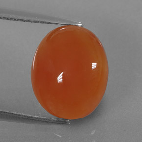 3.65 ct Orange Carnelian Gemstone, Carnelian Gem in Oval Cabochon Shape for Sale.