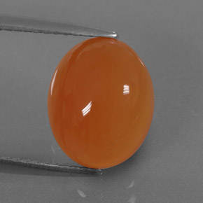 3.91 ct Orange Carnelian Gemstone, Carnelian Gem in Oval Cabochon Shape for Sale.
