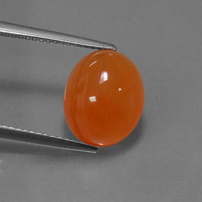 5.07 ct Orange Carnelian Gemstone, Carnelian Gem in Oval Cabochon Shape for Sale.
