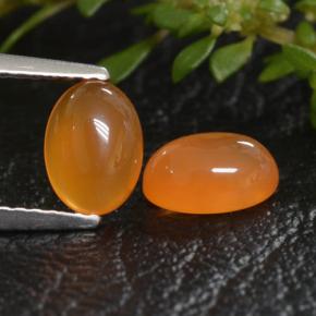 Reddish Orange Carnelian Gem - 0.9ct Oval Cabochon (ID: 469459)