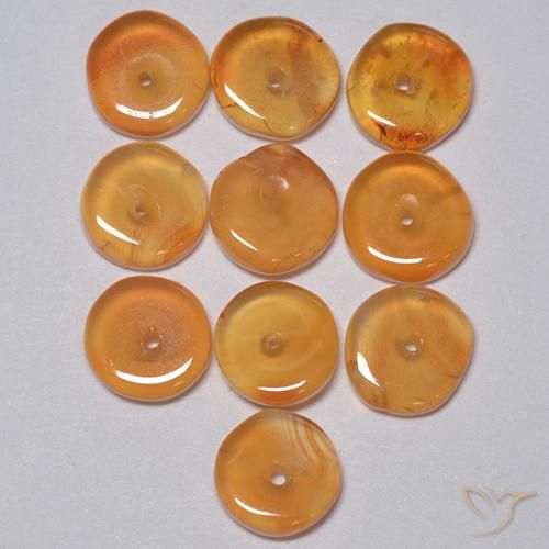 Lotto di 10 pezzi Corniola arancione taglio fantasia dall'India - dimensioni 5,7x5,7 mm, peso totale 4,96 ct / media. 0,5 ct ciascuno, colore: Arancio Medio, durezza Mohs 6,5 - 7 adatto per gioielli da indossare ogni giorno, Photo A