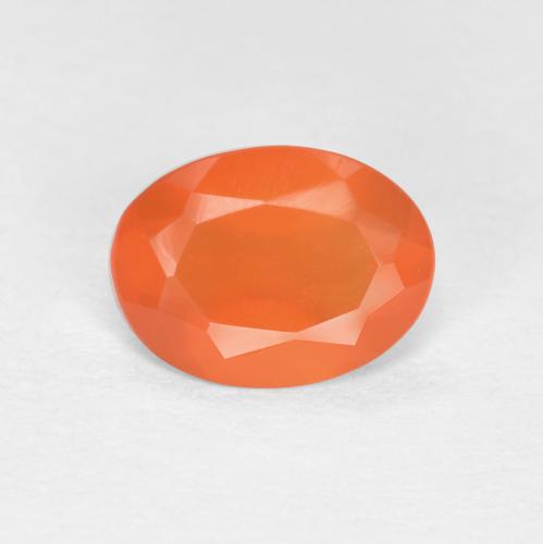 Orange rougeâtre Cornaline gemme - 0.6ct Ovale facette (ID: 556505)