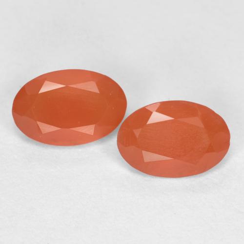 Reddish Orange Carnelian Gem - 0.4ct Oval Facet (ID: 557012)