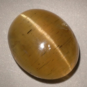 5.96 ct Green Cat's Eye Apatite Gemstone, Cat's Eye Apatite Gem in Oval Cabochon Shape for Sale.