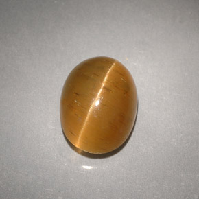 3.94 ct Yellow Cat's Eye Apatite Gemstone, Cat's Eye Apatite Gem in Oval Cabochon Shape for Sale.
