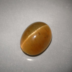 3.94 ct Yellow Cat's Eye Apatite Stone, Natural Cat's Eye Apatite in Oval Cabochon Shape for Sale