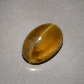 4.79 ct Yellow Cat's Eye Apatite Gemstone, Cat's Eye Apatite Gem in Oval Cabochon Shape for Sale.