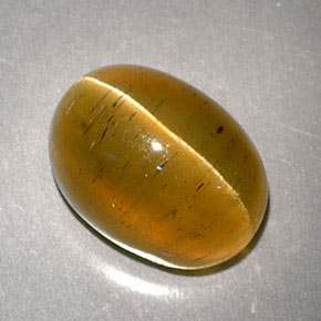 3.32 ct Yellow Cat's Eye Apatite Gemstone, Cat's Eye Apatite Gem in Oval Cabochon Shape for Sale.