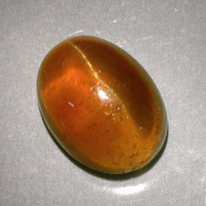 Cat's Eye Apatite Gemstone in 9 x 7 mm (calibrated) Size for Sale, Cat's Eye Apatite Stone in Orange Color