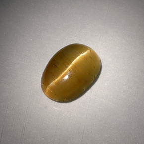3.01 ct Yellow Cat's Eye Apatite Gemstone, Cat's Eye Apatite Gem in Oval Cabochon Shape for Sale.